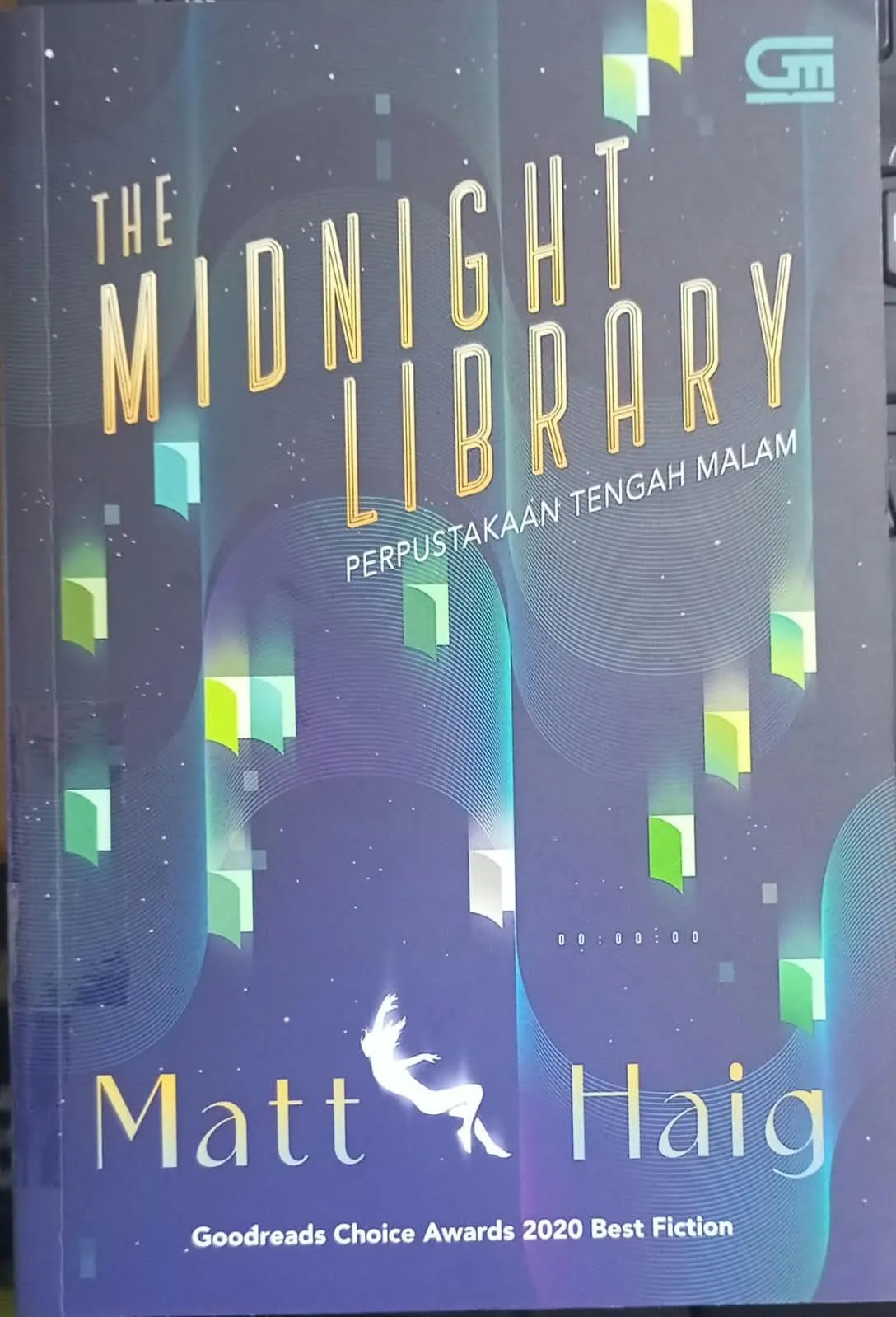 Cover PERPUSTAKAAN TENGAH MALAM